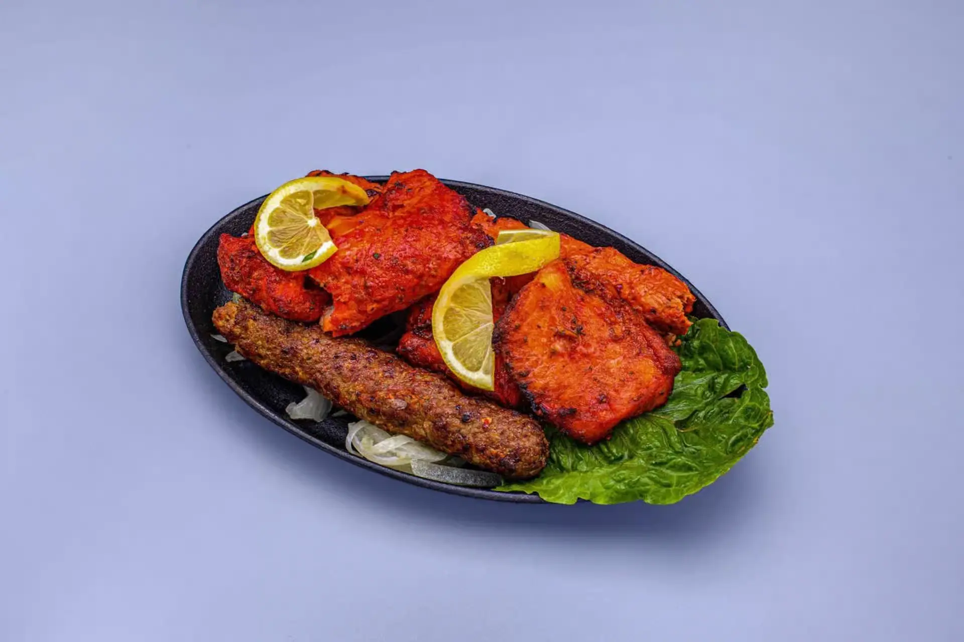 Tandoori specialties and BBQ platters at Twist of TAJ Nolan Hill Calgary